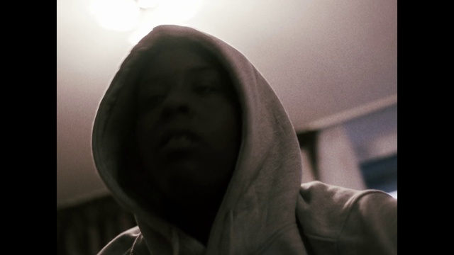 Video Reference: Face, Black, Hair, White, Photograph, Facial expression, Nose, Head, Skin, Lady