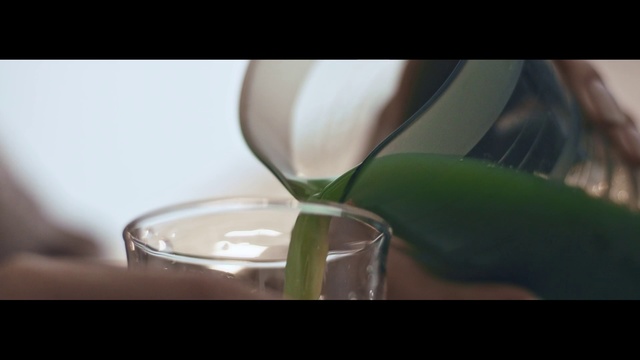 Video Reference: Green, Close-up, Hand, Still life photography, Material property, Photography, Plant, Glass, Black hair, Macro photography, Person
