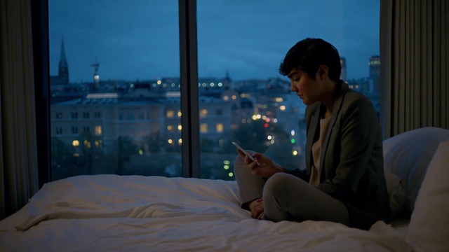 Video Reference: Bed, Snapshot, Room, Human, Night, Textile, Sitting, Bed sheet, Winter, Adaptation