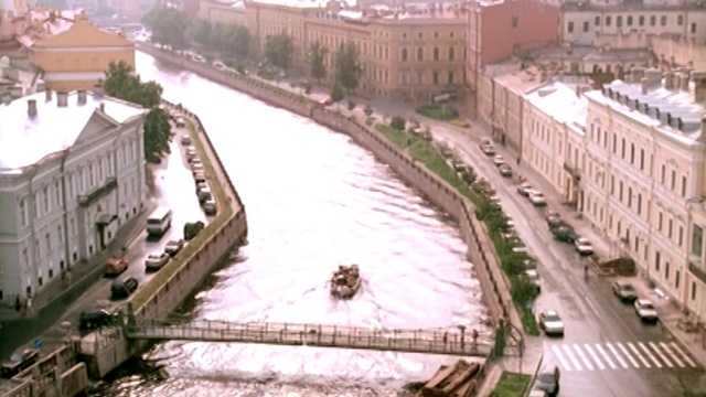 Video Reference: Waterway, Canal, Town, Human settlement, City, Urban area, Thoroughfare, Urban design, Neighbourhood, Residential area