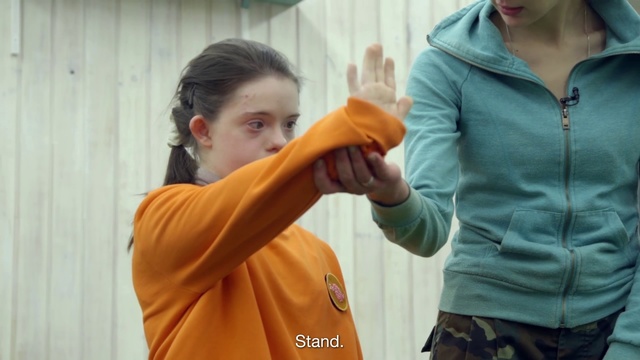 Video Reference: Shoulder, Arm, Joint, Finger, Hand, Gesture, Ear, Jacket, Sleeve