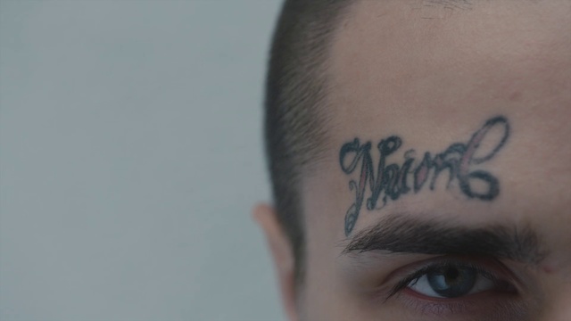 Video Reference: Forehead, Face, Eyebrow, Skin, Temporary tattoo, Tattoo, Head, Eye, Cheek, Organ