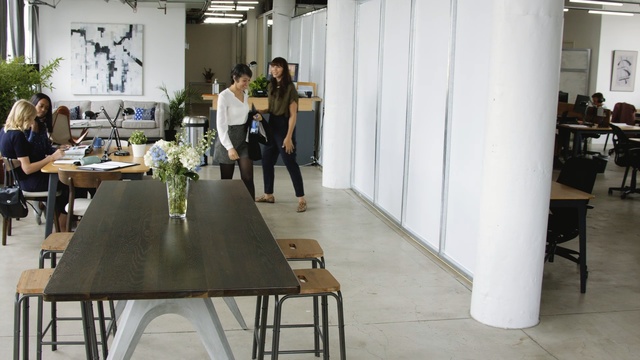 Video Reference: Table, Furniture, Floor, Room, Interior design, Design, Flooring, Architecture, Chair, Textile, Indoor, Dining, Building, Woman, People, Wooden, Standing, Living, Kitchen, Sitting, Wine, Man, Group, Vase, Flower, Houseplant, Clothing, Flowerpot, Coffee table, Person, Desk