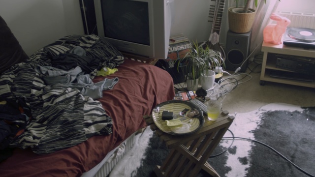 Video Reference: Room, Furniture, Table, House, Textile, Home, Couch, Person