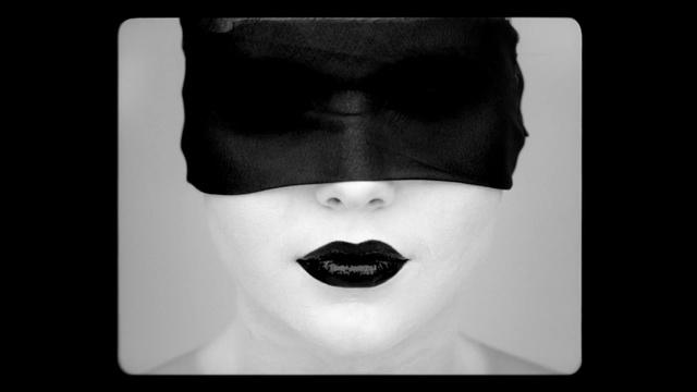 Video Reference: Face, White, Lip, Eyewear, Nose, Moustache, Head, Eyebrow, Chin, Black-and-white