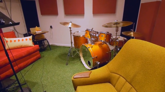 Video Reference: room, drums, musical instrument, percussion, table, tom tom drum, interior design, drum, chair