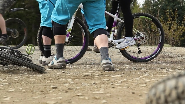 Video Reference: cycle sport, land vehicle, bicycle, mountain bike, footwear, vehicle, sports equipment, cycling, bicycle accessory, road bicycle