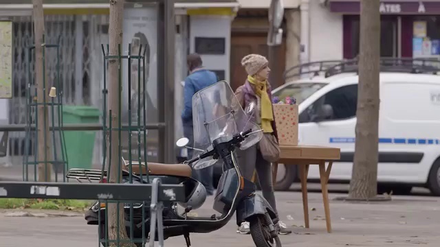 Video Reference: Mode of transport, Product, Transport, Snapshot, Sitting, Vehicle, Urban area, Scooter, Street, Pedestrian