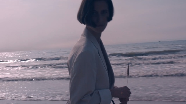 Video Reference: sea, ocean, sky, vacation, beach, girl, water, wave, fun, neck, Person