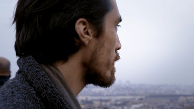 Video Reference: facial hair, chin, sky, neck