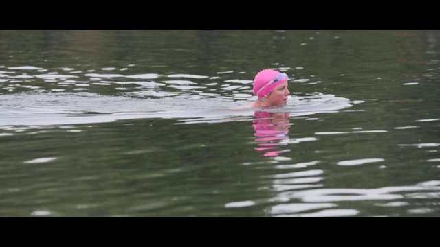 Video Reference: Water, Pink, Recreation, Swimming, Open water swimming, Headgear, Swim cap, Leisure