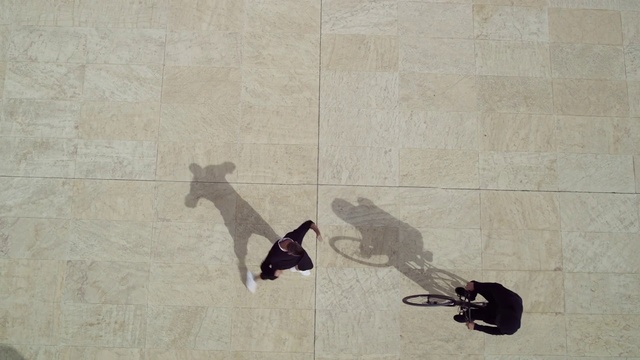 Video Reference: Shadow, Wall, Footwear, Tile, Visual arts, Leg, Floor, Shoe, Flooring