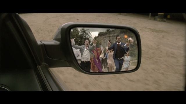 Video Reference: Rear-view mirror, Automotive mirror, Mirror, Vehicle door, Mode of transport, Motor vehicle, Auto part, Vehicle, Reflection, Automotive side-view mirror, Person