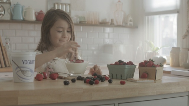 Video Reference: room, interior design, furniture, table, baking, food, Person
