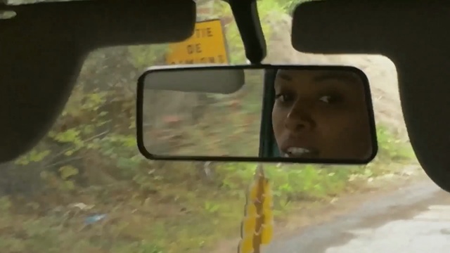 Video Reference: Rear-view mirror, Automotive mirror, Mode of transport, Auto part, Mirror, Tree, Glass, Glasses, Automotive window part, Person