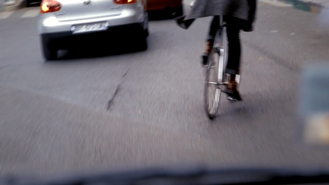 Video Reference: land vehicle, car, motor vehicle, vehicle, mode of transport, automotive design, asphalt, floor, bicycle accessory, automotive exterior