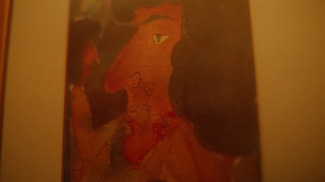 Video Reference: Red, Modern art, Art, Orange, Painting, Visual arts, Portrait, Room, Drawing, Flesh, Photo, Sitting, Covered, Door, White, Table, Yellow, Snow, Refrigerator, Night, Sketch, Human face, Child art, Person, Text