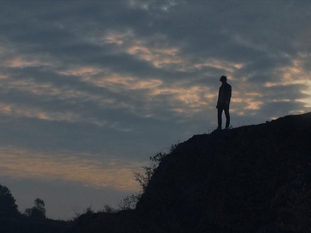 Video Reference: Sky, Cloud, Silhouette, Evening, Hill, Tree, Standing, Mountain, Horizon, Sunset, Person