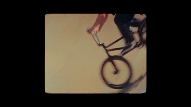 Video Reference: Bicycle, Wheel, Sports equipment, Tire, Window, Bicycle wheel, Bicycle handlebar, Gesture, Bicycle frame, Bicycle fork