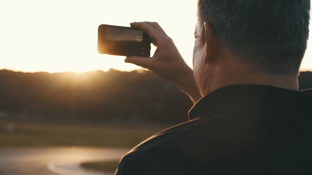 Video Reference: Neck, Hand, Photography, Sunlight, Backlighting, Gadget