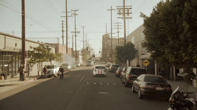 Video Reference: Road, Atmospheric phenomenon, Urban area, Street, Residential area, Mode of transport, Town, Lane, Thoroughfare, Neighbourhood