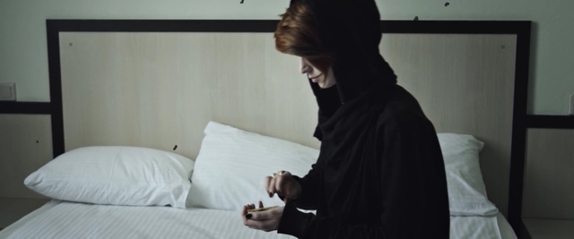 Video Reference: shoulder, room, girl, joint, outerwear, furniture, neck