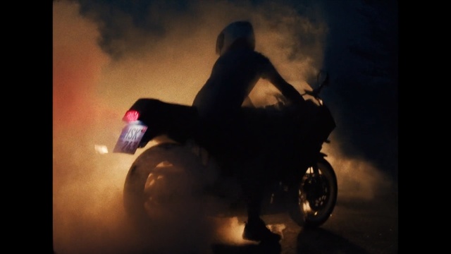 Video Reference: Motorcycle, Darkness, Vehicle, Atmosphere, Photography, Sitting, Flash photography, Night, Midnight, Extreme sport