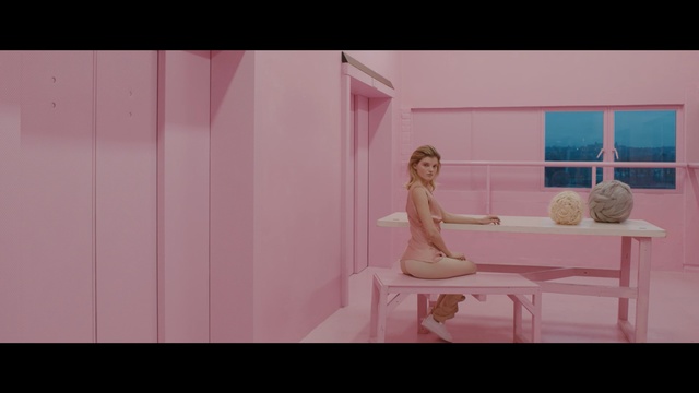 Video Reference: pink, room, light, snapshot, girl, purple, wall, sitting, leg, floor