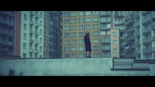 Video Reference: urban area, building, sky, metropolis, tower block, architecture, residential area, wall, skyscraper, daytime, Person