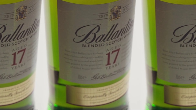 Video Reference: Drink, Product, Alcoholic beverage, Bottle, Distilled beverage, Liqueur, Wine bottle, Material property, Wine, Glass bottle