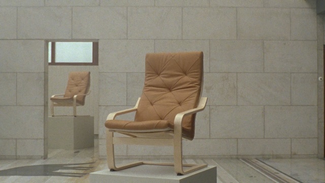 Video Reference: Furniture, Chair, Beige, Room, Comfort, Floor, Armrest, Interior design, Table, Leather