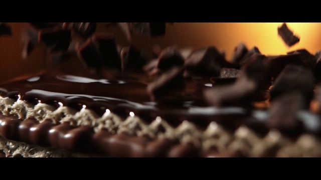 Video Reference: Footwear, Chocolate, Brown, Shoe, Font, Still life photography, Photography, Dessert, Cake