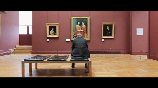 Video Reference: furniture, table, floor, sitting, flooring, tourist attraction, art gallery, hardwood, interior design, wood
