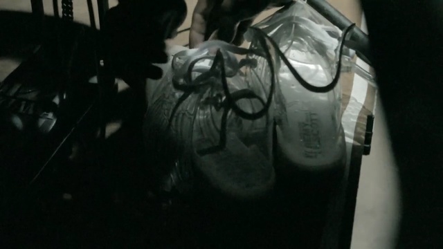 Video Reference: footwear, black, light, shoe, product, darkness, font, personal protective equipment, Person