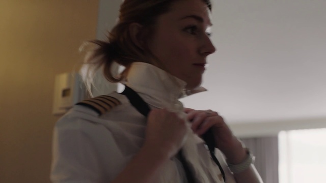 Video Reference: White, Shoulder, Neck, Outerwear, Hand, Brown hair, Photography, Sleeve, Jacket, Fashion accessory