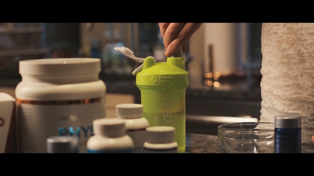 Video Reference: product, bottle, drink, product, glass, drinkware, tableware, glass bottle, plastic bottle, cup