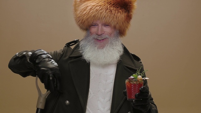 Video Reference: Hair, Fur, Clothing, Fur clothing, Facial hair, Fashion, Beard, Headgear, Outerwear, Coat