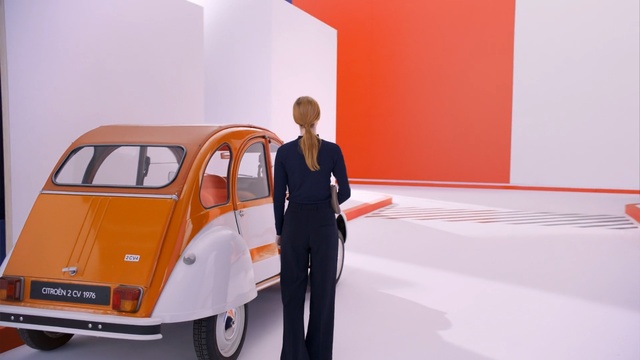 Video Reference: Land vehicle, Car, Vehicle, Motor vehicle, Mode of transport, Classic car, Yellow, Classic, Automotive design, City car, Person