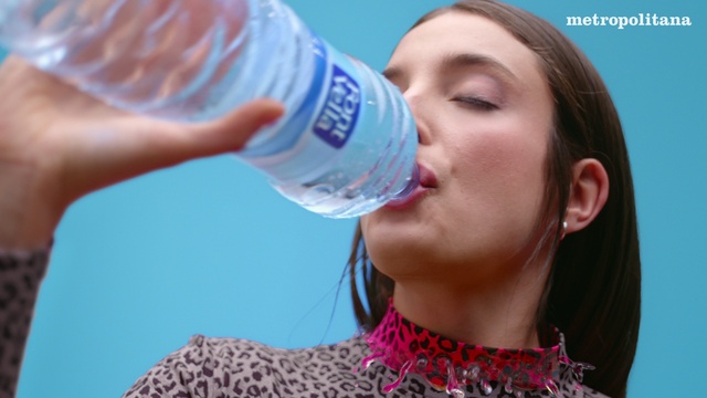 Video Reference: Hair, Face, Skin, Head, Water, Lip, Bottled water, Liquid, Mineral water, Drinkware