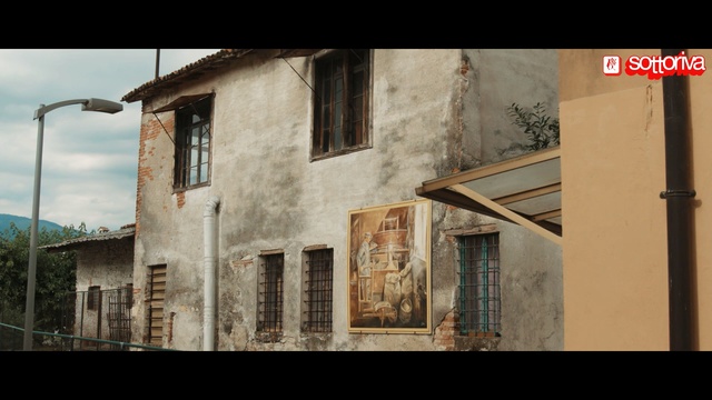 Video Reference: town, facade, building, sky, house, window, village, history, Person