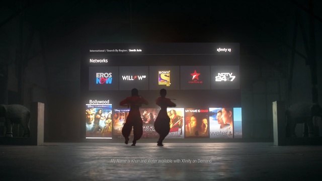 Video Reference: light, night, darkness, technology, advertising, stage, display device, recreation, Person