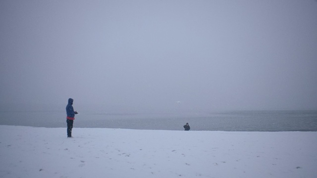 Video Reference: Sky, Winter, Atmospheric phenomenon, Snow, Sea, Water, Freezing, Horizon, Calm, Ocean, Person