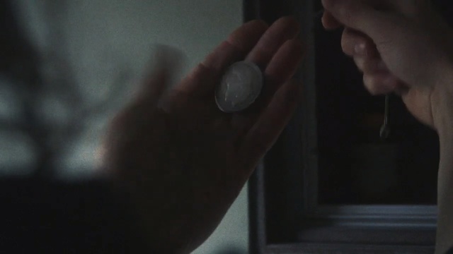 Video Reference: hand, finger, darkness, arm, mouth, thumb