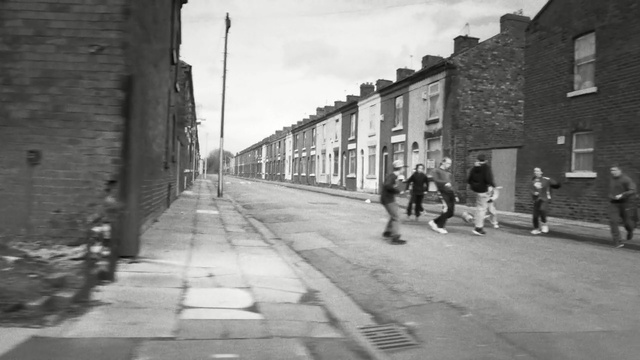 Video Reference: sidewalk, street, architecture, building, city, Person