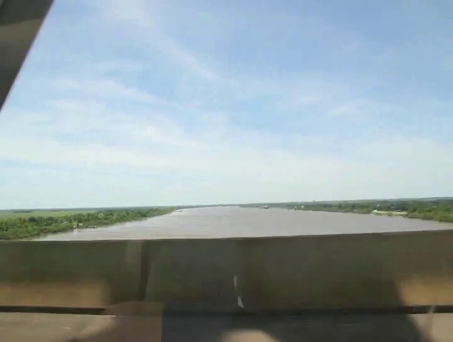 Video Reference: Cloud, Sky, Natural environment, Water, Asphalt, Air travel, Plain, Horizon, Grass, Road