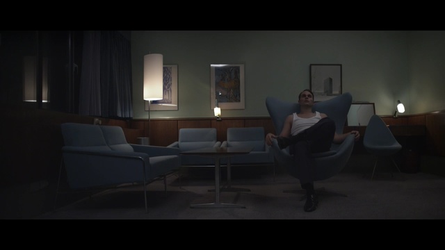 Video Reference: furniture, couch, room, mode of transport, light, darkness, lighting, photography, living room, interior design