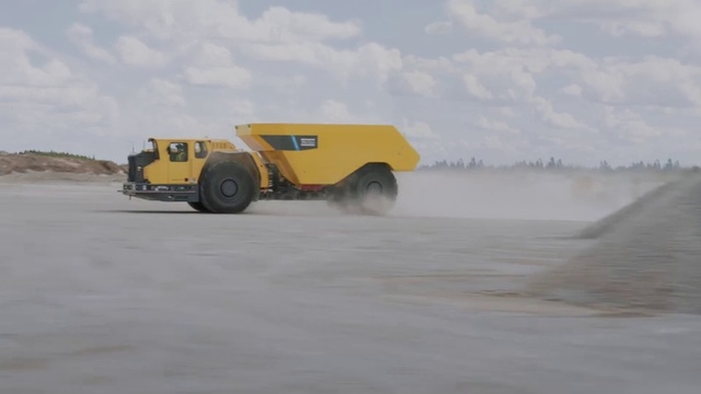 Video Reference: Sand, Vehicle, Yellow, Transport, Mode of transport, Construction equipment, Dust, Automotive wheel system, Landscape, Asphalt