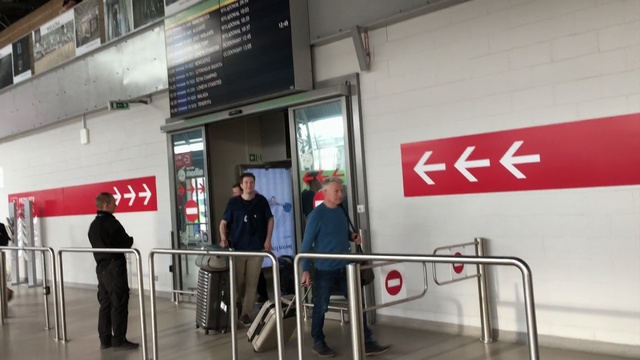 Video Reference: Check-in, Infrastructure, Building, Door, Signage, Advertising, Person