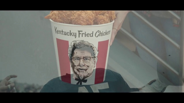 Video Reference: Text, Forehead, Human, Font, Photography, Photo caption, Person, Cup, Photo, Coffee, Sitting, Front, Table, Man, Glass, Food, Woman, Bird, White, Sign, Human face, Cartoon, Art, Drawing, Glasses, Smile