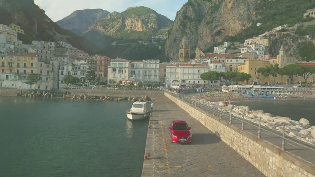 Video Reference: Body of water, Waterway, Town, Tourism, River, Coast, Coastal and oceanic landforms, Harbor, Mountain range, Fjord